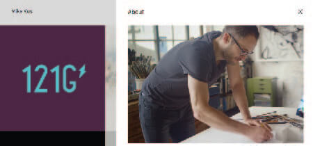 Photo of a man drawing on the Mike Kus website